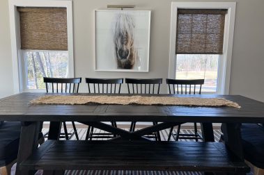 Dining Room table located at the Clubhouse at The Timbers, a Socha Companies community