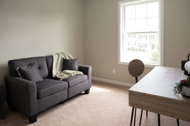 Bedroom 2 of a 3 Bedroom Unit in The Timbers, a high-end townhouse community by Socha Companies in Manchester NH